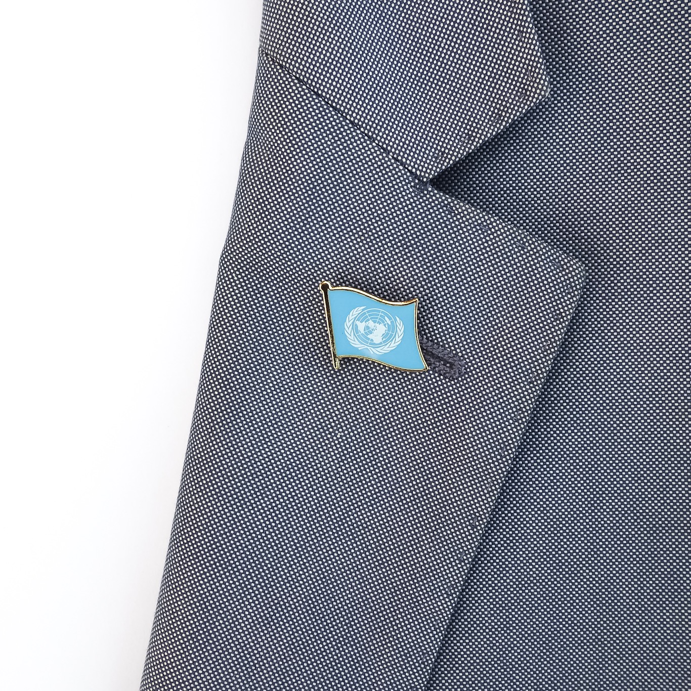 Zlatá brož Vlajka OSN