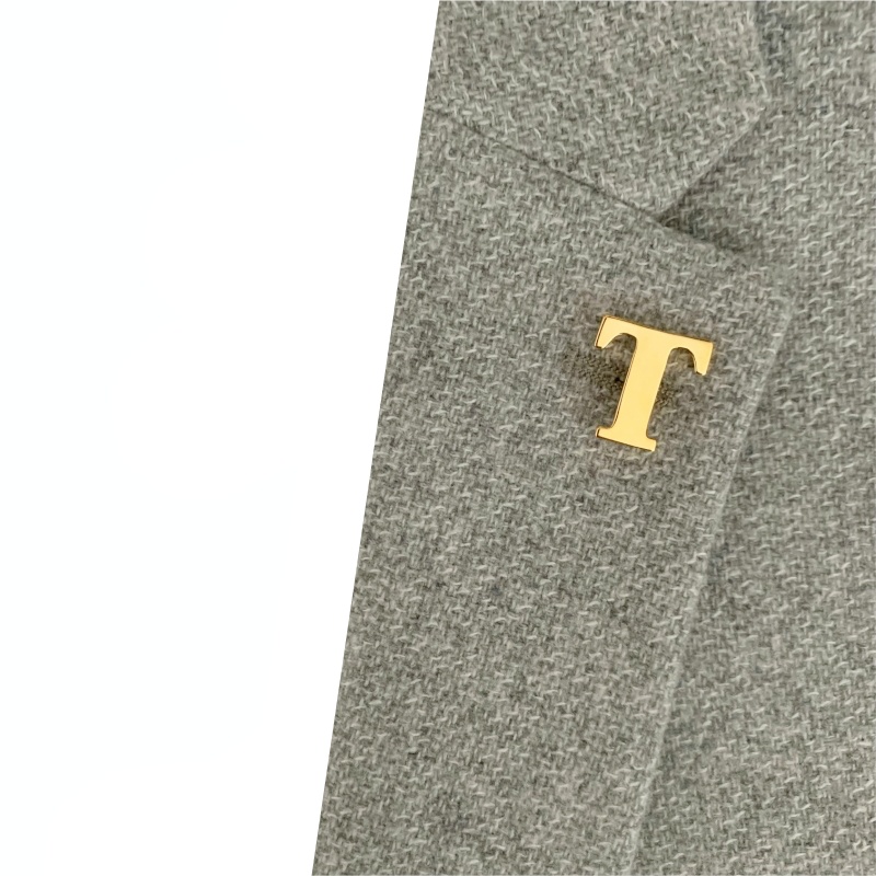 Zlatá brož písmeno T