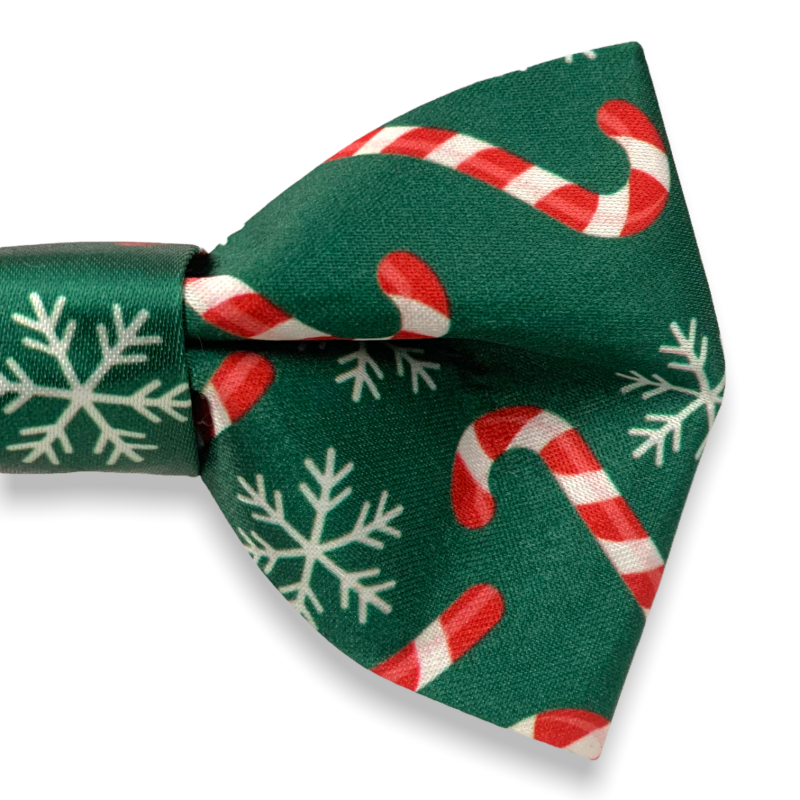 Zelený chlapecký motýlek Vánoční lízátka a vločky