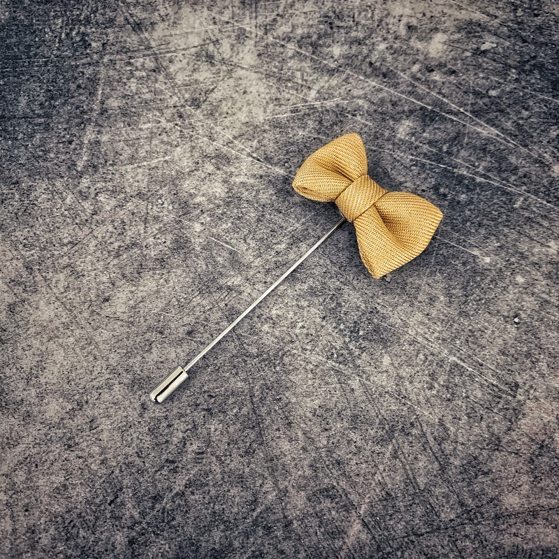 Zlatá brož Motýlek