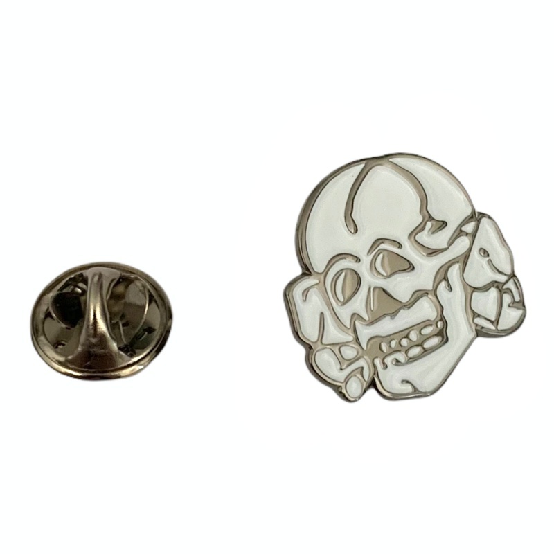 Brož Lebka s kostmi 