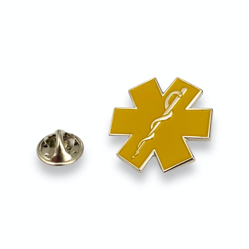 Žlutá brož Medical znak 