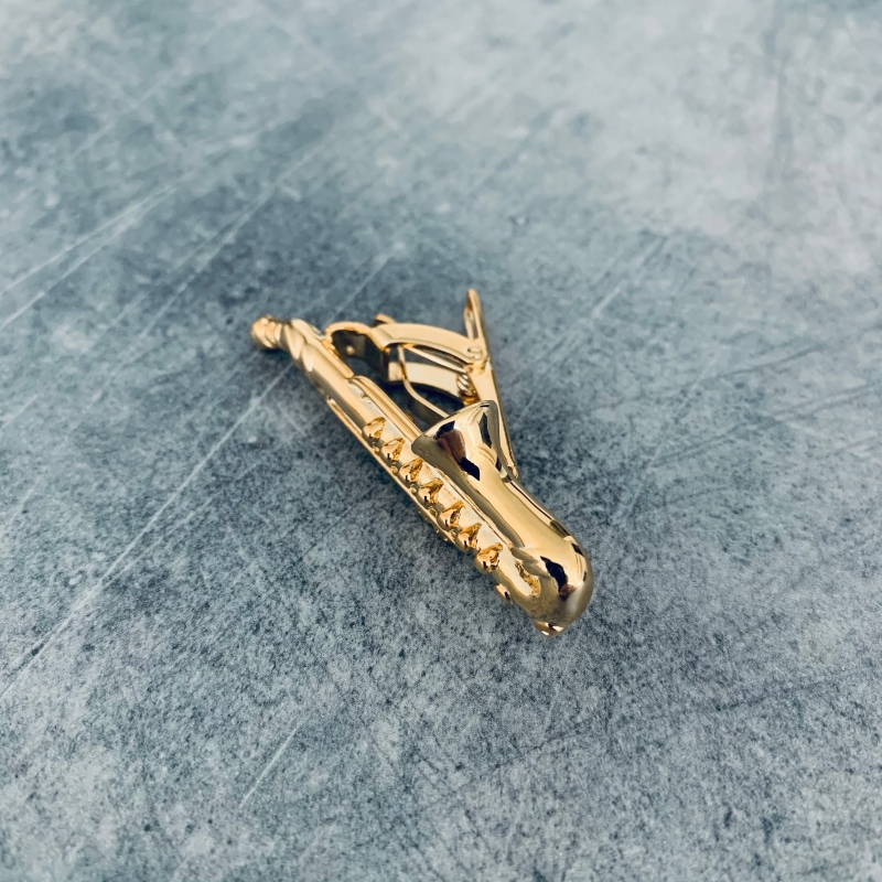 Zlatý set - spona na kravatu a manžetové knoflíčky Saxofon