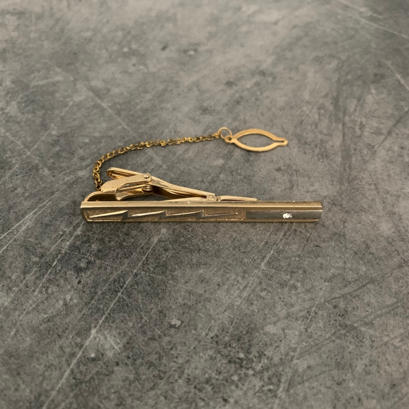 Zlatá spona na kravatu Blesk 