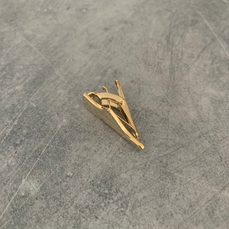 Zlatá spona na kravatu Bota 